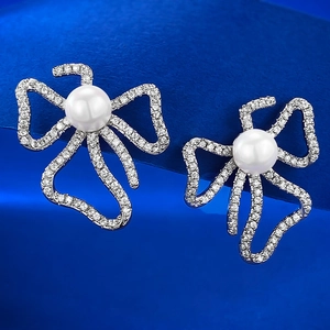 Elegant 925 sterling silver bow knot stud earrings with 6mm pearls and pavé stones