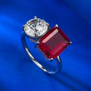 Elegant S925 silver ring featuring a round brilliant diamond and red emerald-cut ruby