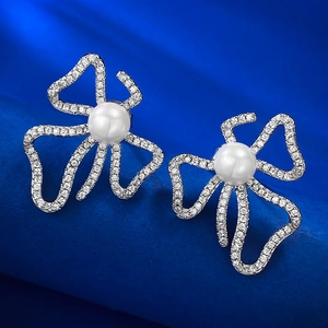 Bow-knot 925 sterling silver stud earrings with sparkling zircon and round 6mm pearls