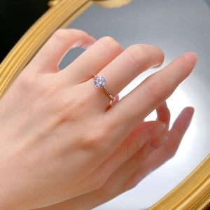 Close-up of 925 silver ring featuring a brilliant round solitaire diamond simulation