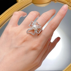 Bague élégante en argent 925 avec nœud, perle naturelle de 8mm et zircons scintillants