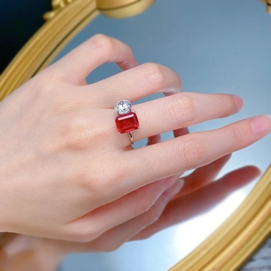Close-up of S925 silver ring featuring a large red rectangle zircon and round clear stone