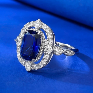 Macro shot of a vintage S925 silver ring with a large blue sapphire-like rectangular stone