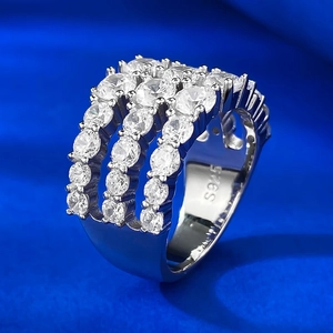 Macro shot of 925 silver luxury ring band featuring four rows of pavé set cubic zirconia