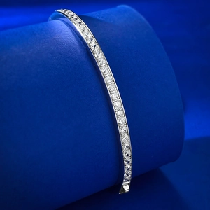 Detailed macro view of 925 silver bracelet with sparkling single row pavé cubic zirconia