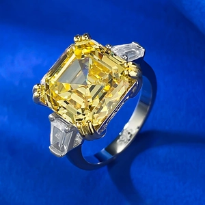 S925 silver ring featuring an emerald-cut yellow carbon diamond with baguette side stones