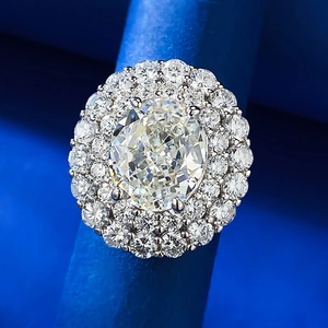 Luxurious oval cut ice flower carbon diamond ring with double halo pavé setting in silver