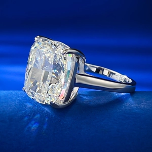 Macro shot of 925 silver wedding ring showing the S925 hallmark and cushion cut diamond