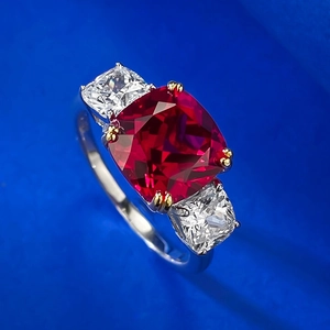 S925 sterling silver ring with a large cushion-cut red ruby and clear side stones