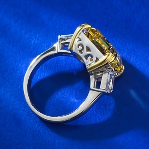 Detailed side view of 925 silver ring featuring a yellow cushion-cut stone and side diamonds