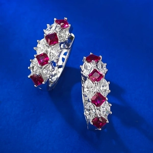 Elegant silver earrings with red square rubies and white marquise zircons in half-hoop design