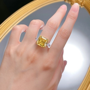 925 silver ring with 12mm yellow Asscher cut stone and trapezoid side diamonds