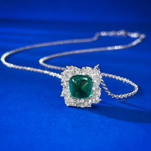 Elegant emerald green square cabochon necklace with silver chain and halo stones