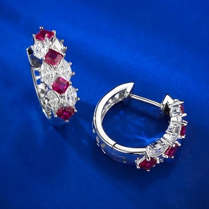 Detailed close-up of S925 silver hoop earrings featuring red and white cubic zirconia
