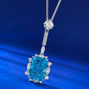 Macro shot of Radiant-cut blue gemstone pendant with S925 silver finish and marquise stones
