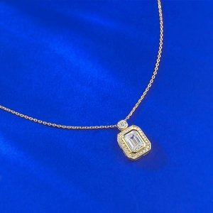 925 silver gold necklace with emerald-cut crystal perfume bottle pendant on blue velvet
