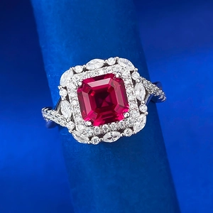 Luxurious S925 silver ring featuring a rectangular pigeon blood red gemstone with zircon halo