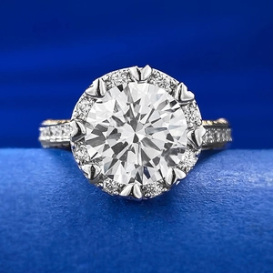 Elegant S925 sterling silver ring with 3 carat round diamond and halo setting on blue velvet