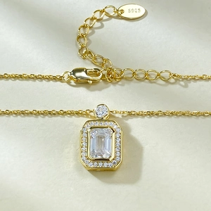 Macro shot of S925 sterling silver perfume bottle pendant with rectangle clear gemstone