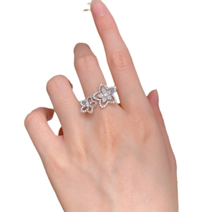 Elegant silver S925 floral open ring featuring dual flower petals with cubic zirconia