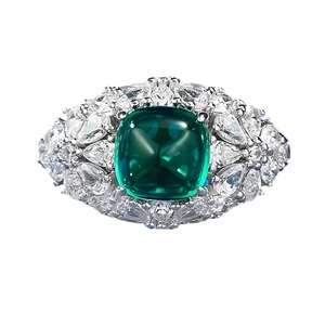 Elegant S925 silver ring featuring a 6.5mm sugarloaf emerald and cluster of clear zircons