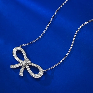 Sparkling 925 sterling silver bow pendant necklace with full micro-pave crystals