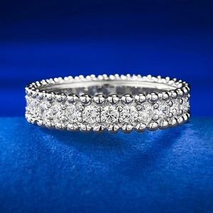Sparkling 925 silver eternity ring with micro-pave crystals and milgrain edges