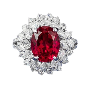 Elegant S925 silver ring featuring an oval pigeon blood red ruby and pear-cut zircon halo