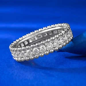 Macro view of full eternity 925 silver ring featuring micro-paved crystals and bead edge