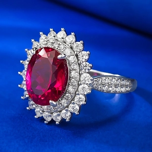 Elegant S925 silver halo ring with oval ruby-style center stone and pavé zircon clusters