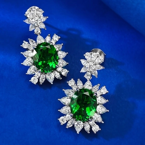 Luxurious S925 sterling silver drop earrings with oval green emerald and zircon clusters
