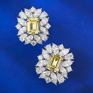 Boucles d'oreilles fleur en argent 925 avec pierre jaune rectangulaire et halo brillant