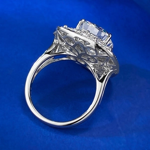 Macro detail of 5-carat ice cut simulated diamond ring with intricate hollow engraving
