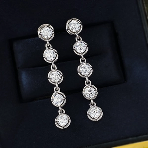 Elegant S925 sterling silver drop earrings with five sparkling stones in a navy gift box