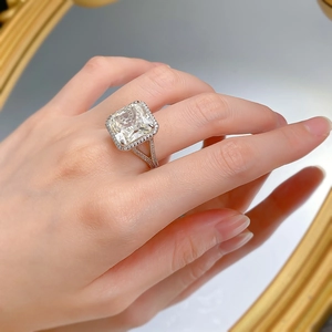 Macro shot of S925 silver halo ring with a large square-cut radiant diamond centerpiece