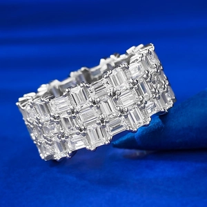 Luxurious emerald cut cubic zirconia multi-row eternity ring in polished silver finish