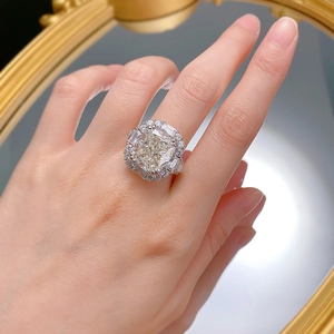 Luxurious S925 silver ring with large cushion cut diamond worn by a model