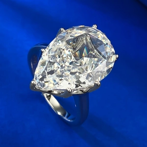 Macro shot of S925 silver ring featuring a large pear-cut high carbon diamond stone