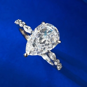 Luxurious S925 silver ring with pear-cut carbon diamond and marquise side stones