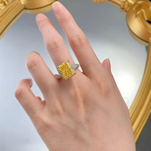 Detailed view of luxury S925 silver ring with 10x12 radiant cut yellow carbon diamond