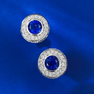 Elegant round blue zircon halo stud earrings with brilliant diamond accents in silver