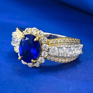 925 silver ring featuring an oval blue sapphire with white zircon lace edge and wide band