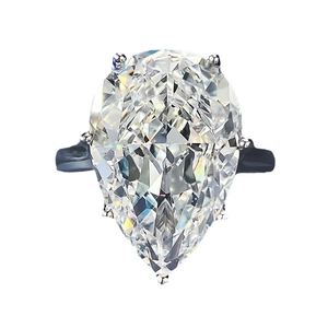 Luxurious pear cut sparkling crystal ring with S925 silver band in a centered studio shot