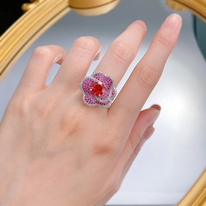 Luxurious S925 silver flower ring with pigeon blood red gemstone and pavé petals