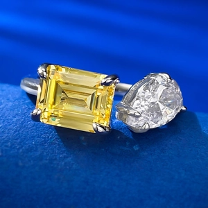 Adjustable S925 silver ring with yellow emerald-cut and teardrop clear stones