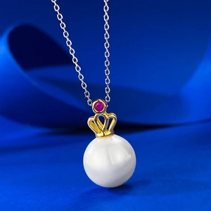 Elegant 11mm white pearl necklace with golden crown pendant and pink gemstone detail