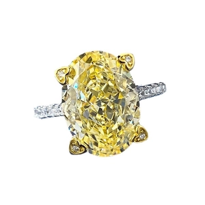 Oval yellow carbon diamond ring with heart-shaped prongs on S925 sterling silver band