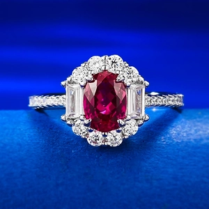 Luxurious S925 silver oval sapphire ring featuring a halo of diamonds and side stones
