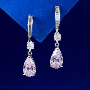 Elegant silver drop earrings with pear-cut pink gemstones and sparkling zircon accents