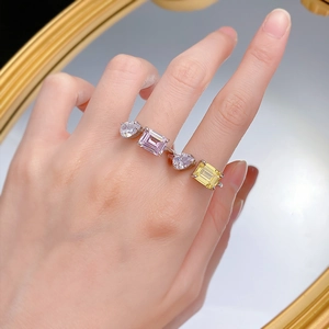 Close-up of S925 silver ring featuring multi-colored rectangular and heart-shaped gems